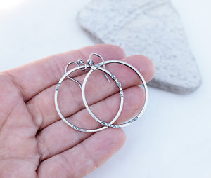 minimalist jewelry. all silver hoops. Silver hoop earrings. 